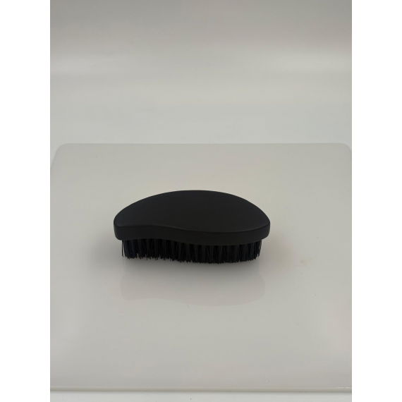Textile cleaning brush