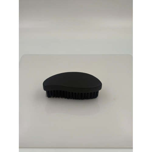 Textile cleaning brush