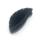 Textile cleaning brush